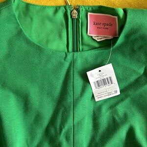 NWT Kate Spade Dress. Green with adorable ruffle sleeves. Size Stretchy 12.